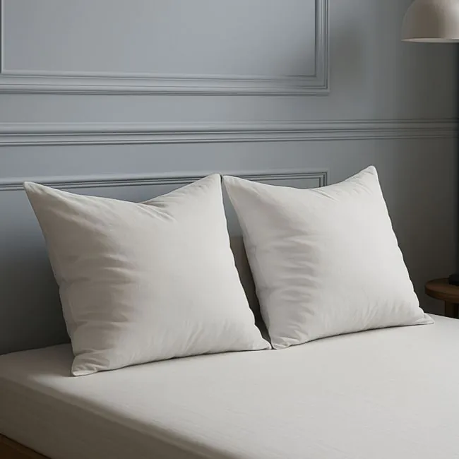 Comparatif oreiller naturel et synthétique pour un sommeil optimal
